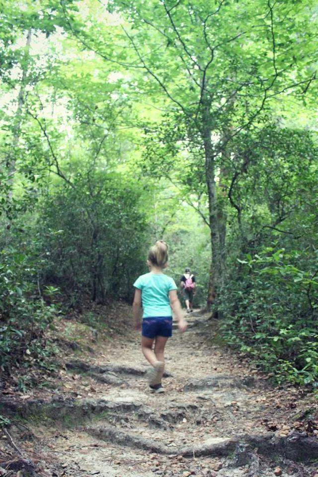 Little girl hiking at Raven Rock State Park in North Carolina.