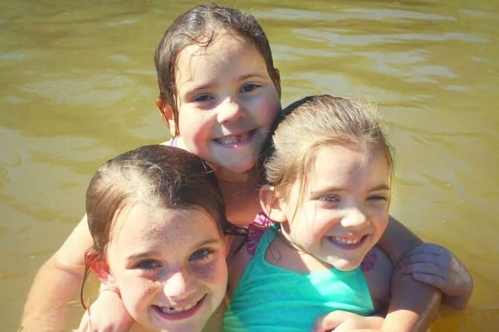 kids swimming at Falling Waters State Park lake