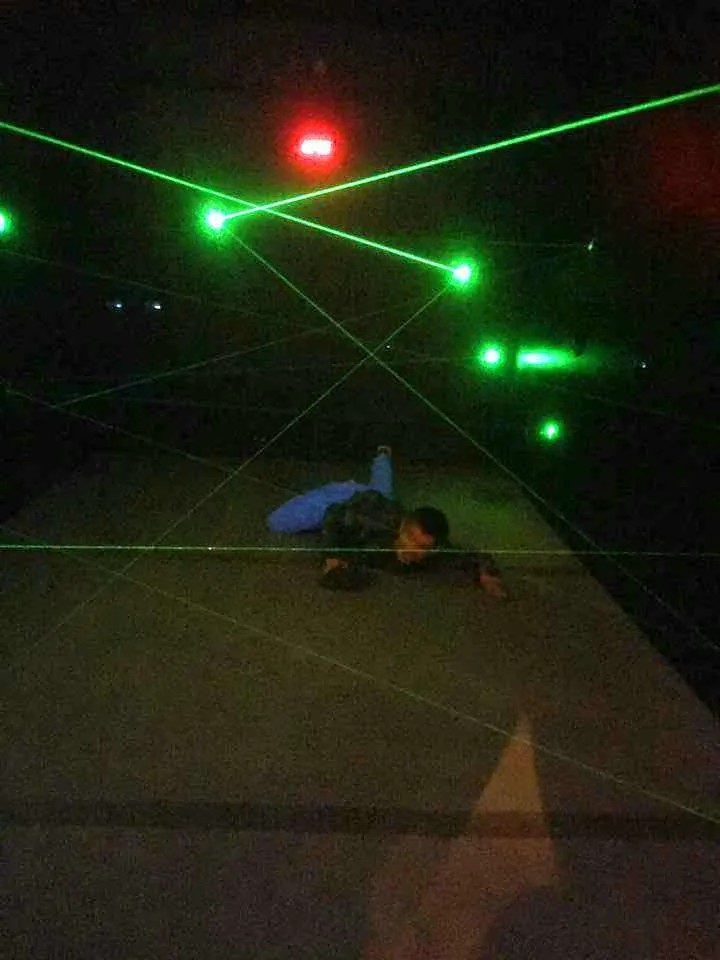 man completing the laser maze at the Island at Pigeon Forge, TN.