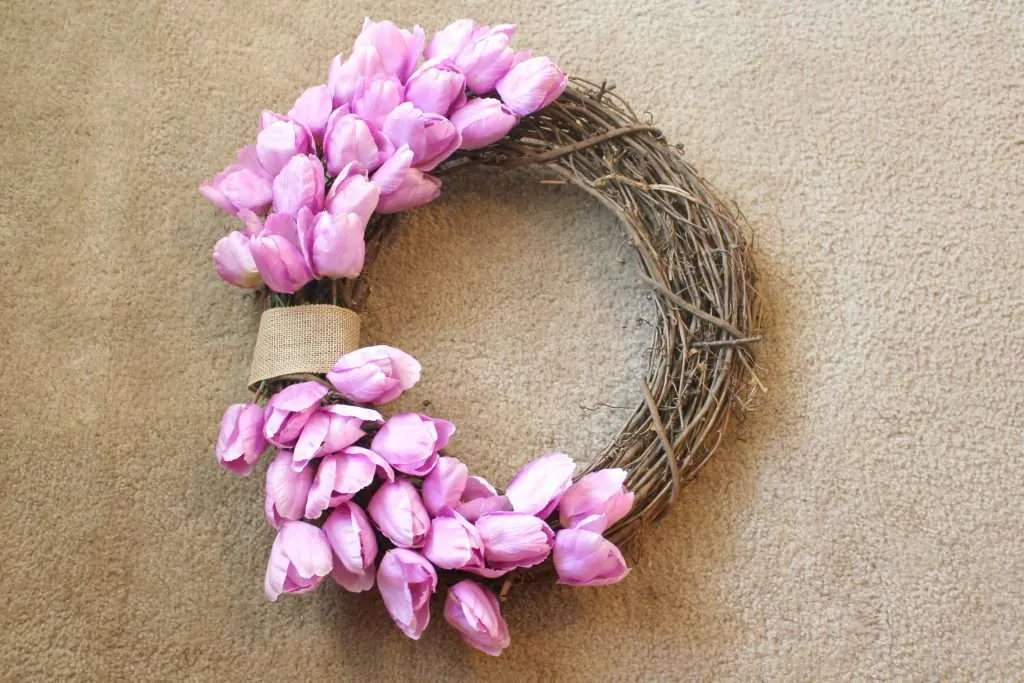 how to make a spring wreath - place tulip stems along the top half of the wreath