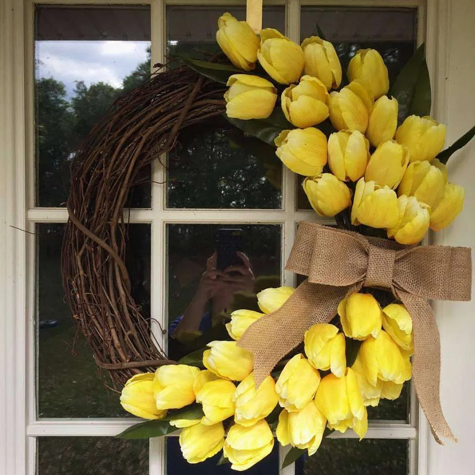 DIY tulip wreath using yellow tulips and burlap ribbon