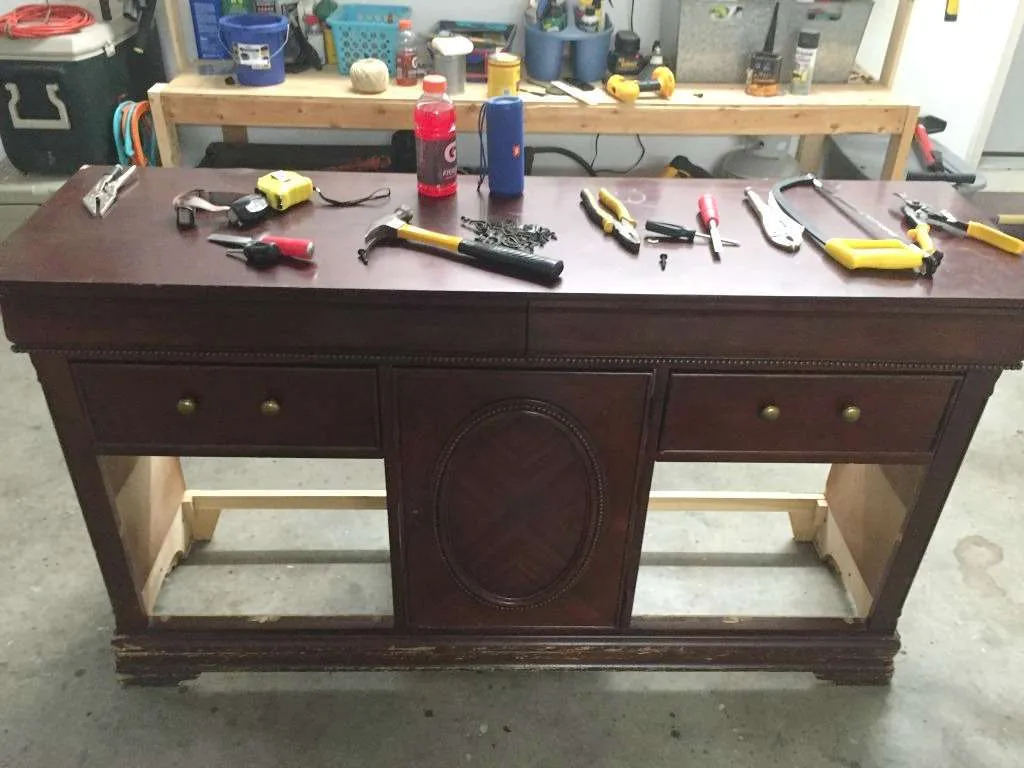 The first step in this dresser refurbish was to remove the drawers and damaged pieces.