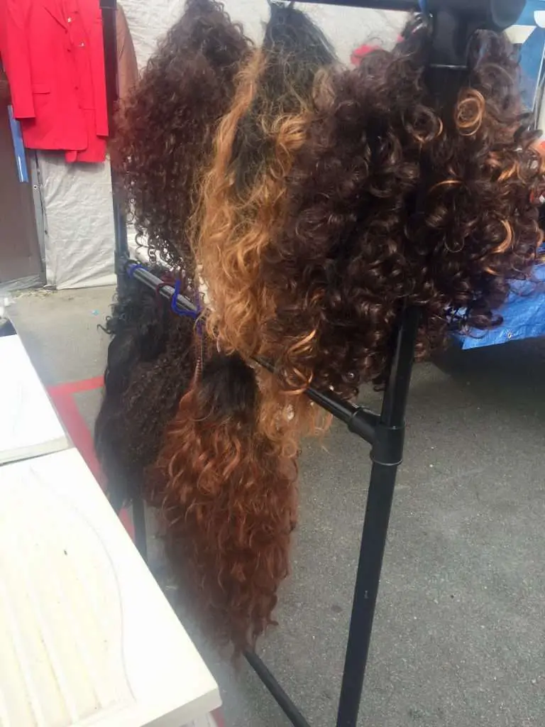 Wigs for sale at the flea market on Bragg Blvd. in Fayetteville, North Carolina.