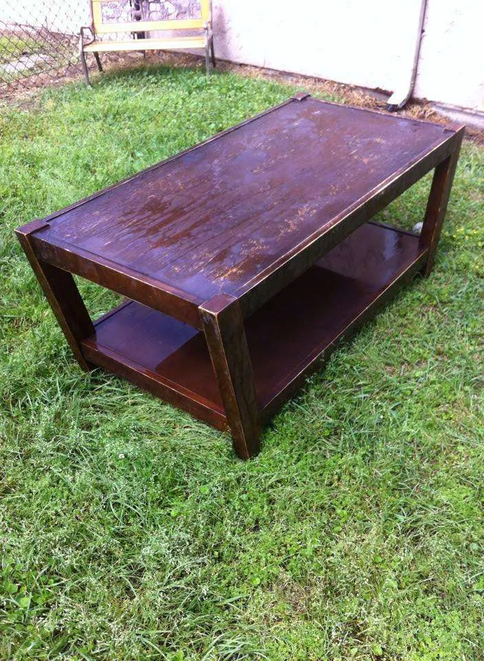 Before picture of the wooden coffee table.
