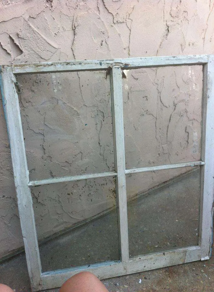 Old window that we turned into a picture frame.