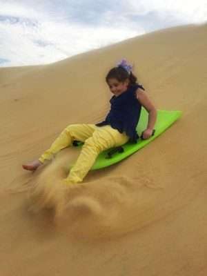Sand sledding at Jockey's Ridge was the most fun we had in the Outer Banks! | Finding Mandee