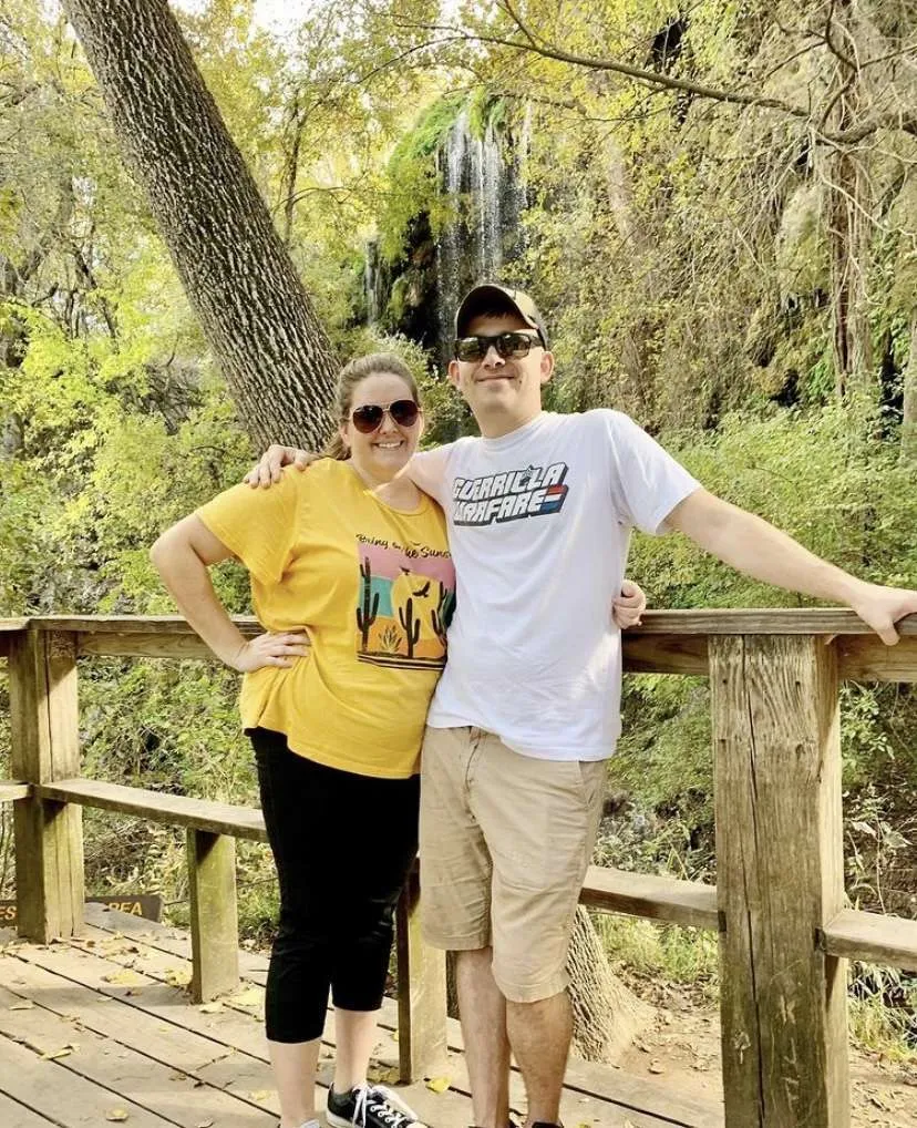 In front of Gorman Falls at Colorado Bend State Park in Texas.