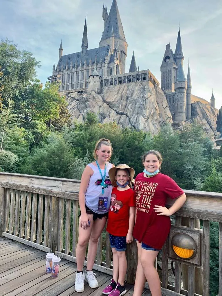 Girls in front of the Hogwarts castle at Islands of Adventure.