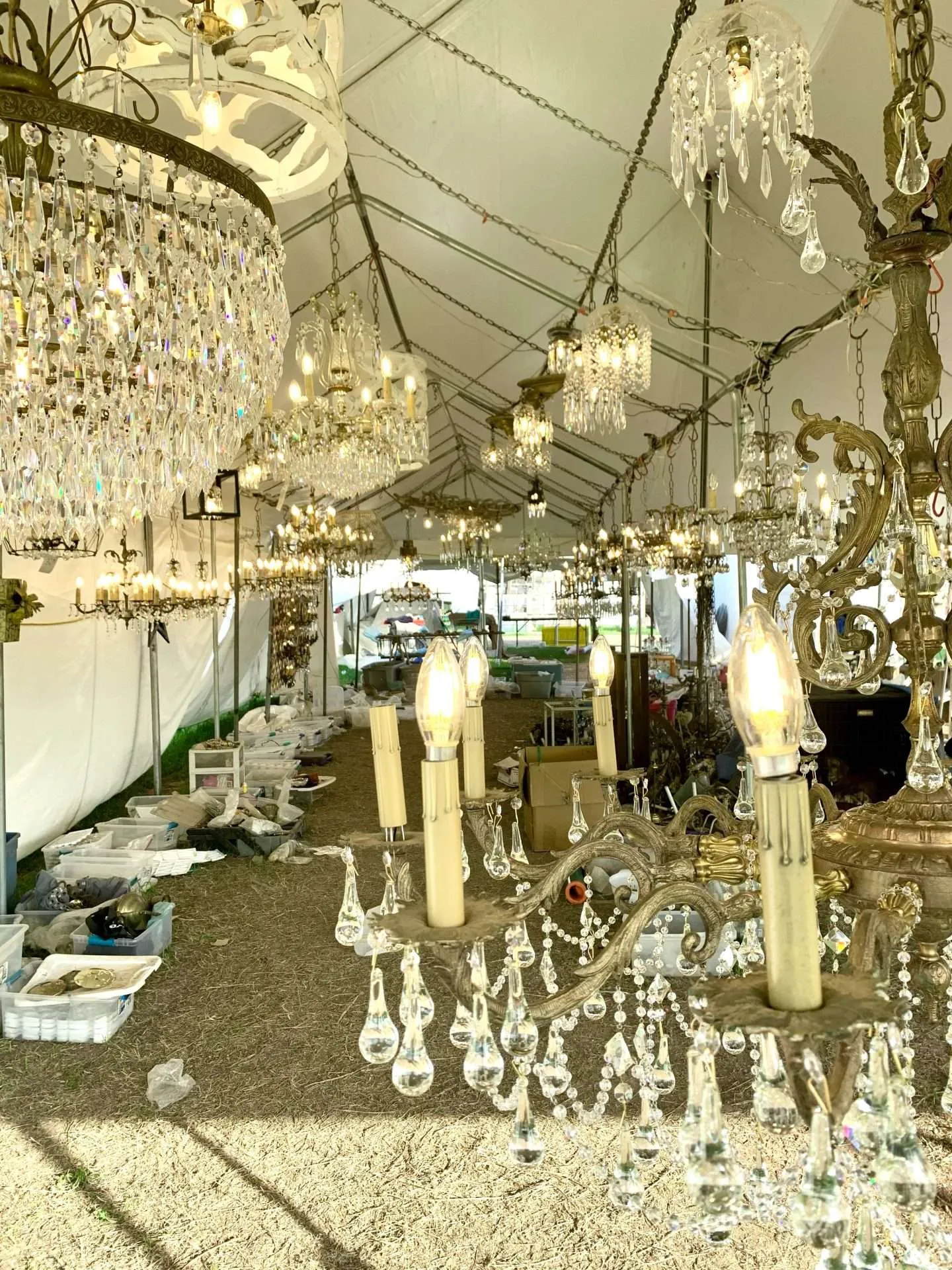 Handmade chandeliers for sale at the flea market.