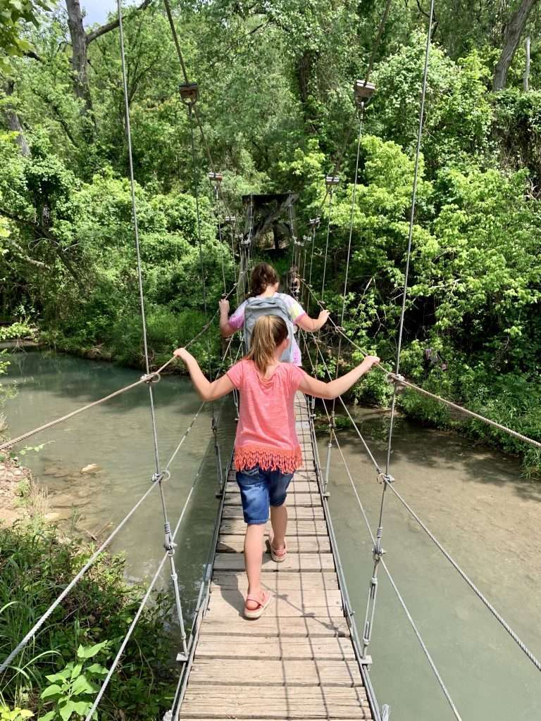 Crossing the suspension bridge on the Chalk Ridge Falls trail. 