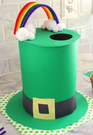 A fun leprechaun trap made out of a green top hat with a rainbow on top.
