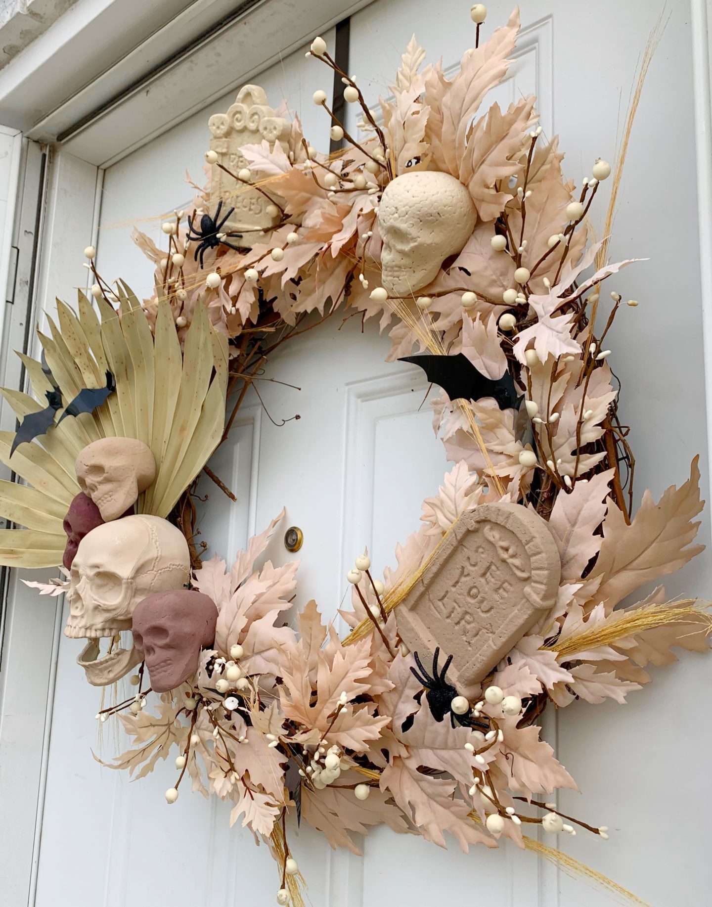 A DIY neutral boho Halloween wreath tutorial.