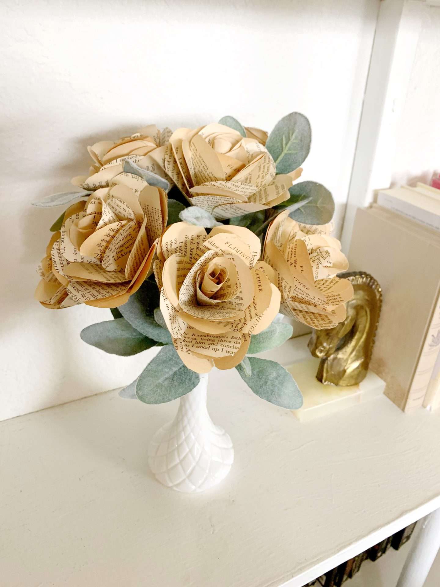 These DIY paper roses are the perfect addition to any bookshelf. 