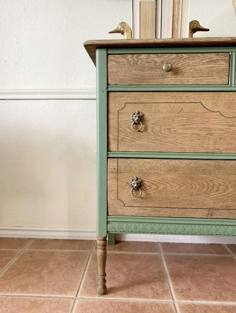 The finishing touch of refurbishing this antique dresser was adding the hardware.
