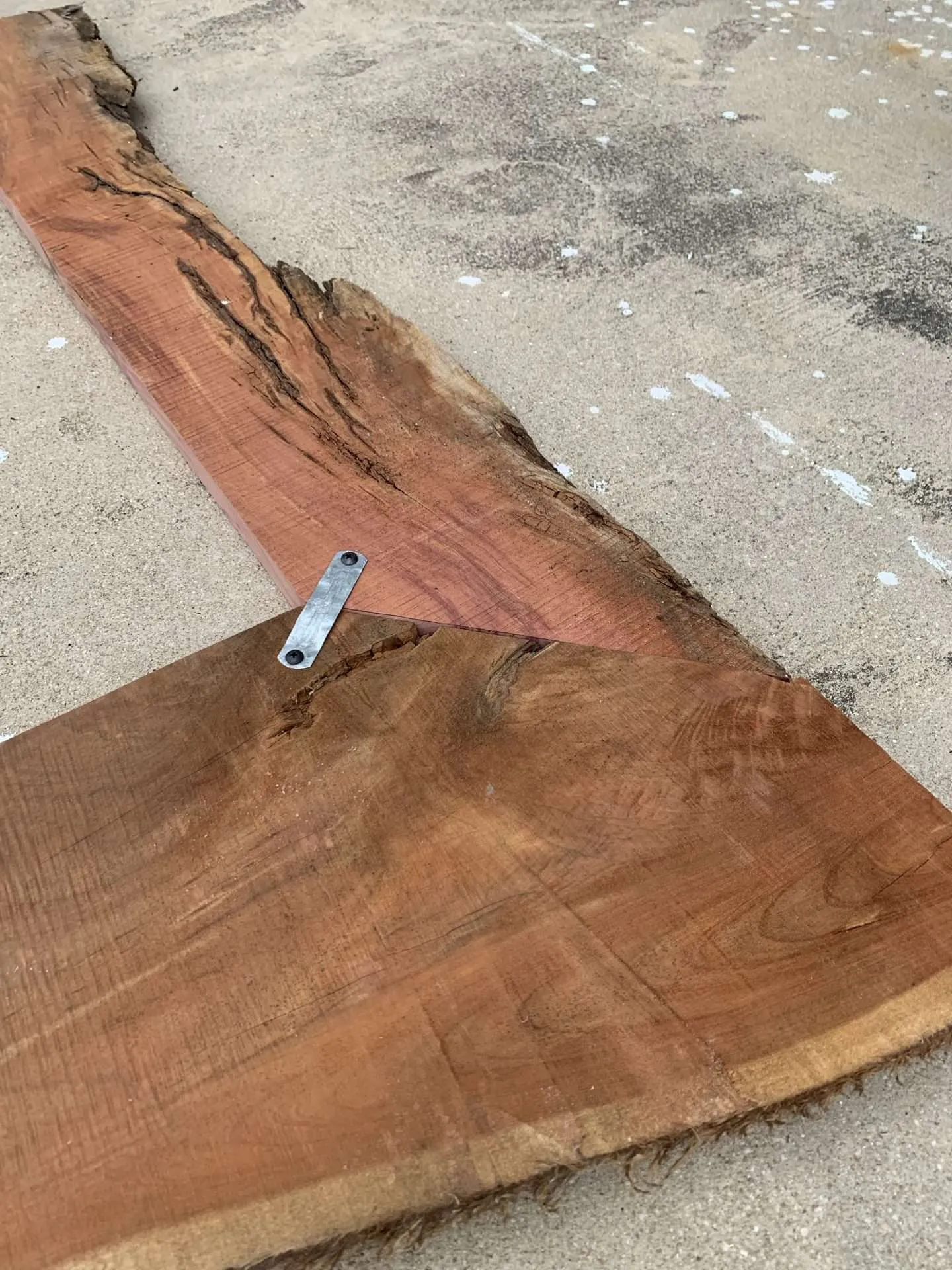 45-degree angle at the top corner of a live edge mirror