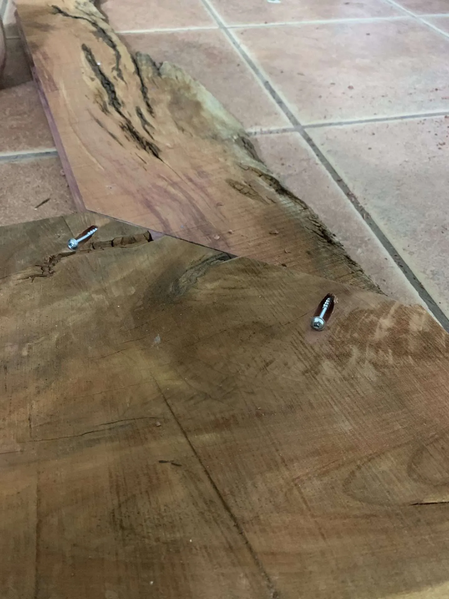 Put together the live edge mirror with a pocket-hole jig and screws.