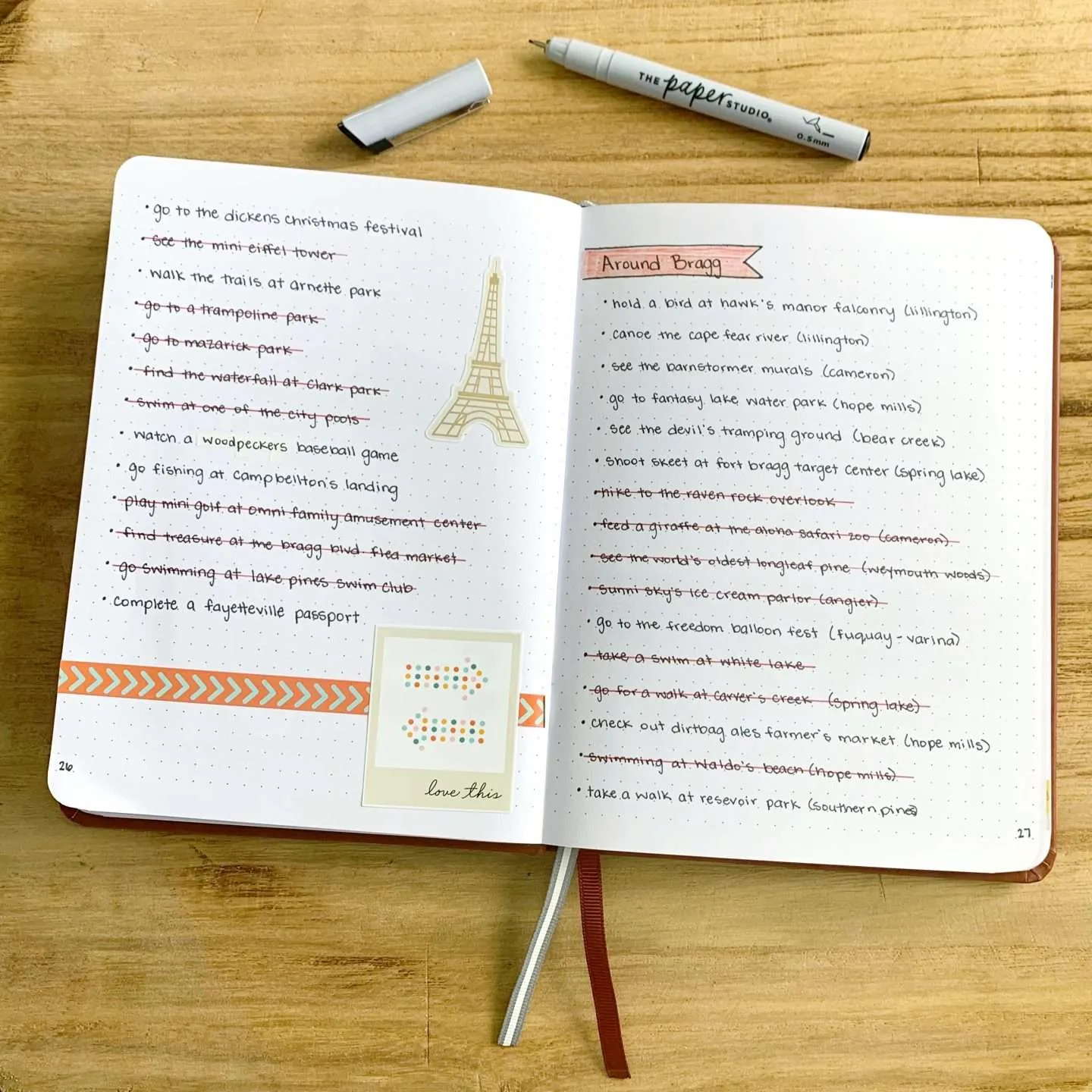 Write down your travel goals in a bucket list bullet journal.