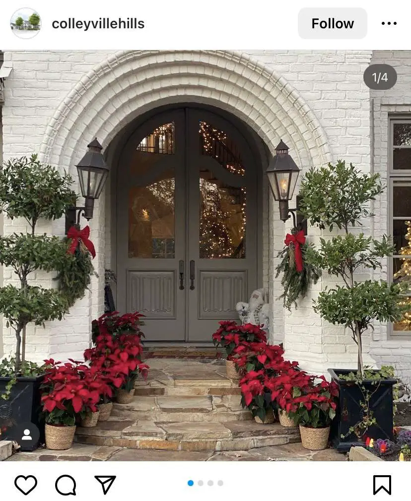 Christmas porch: poinsettia lined stairs