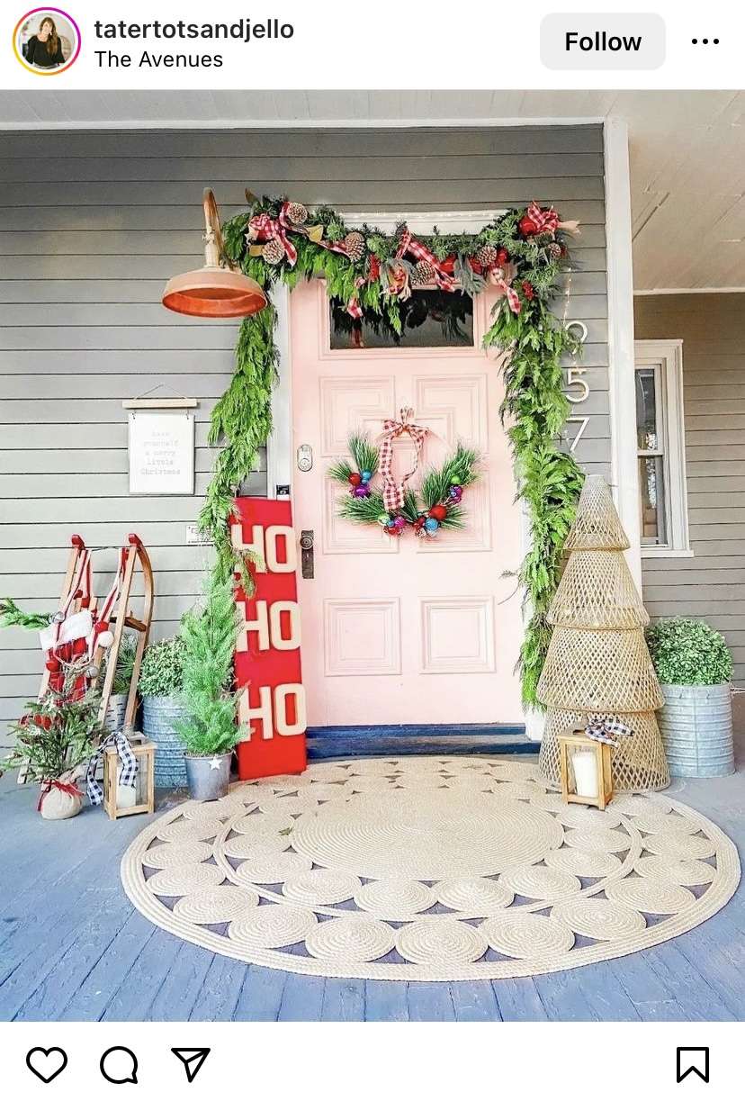 How to decorate the porch for Christmas with a pink door.