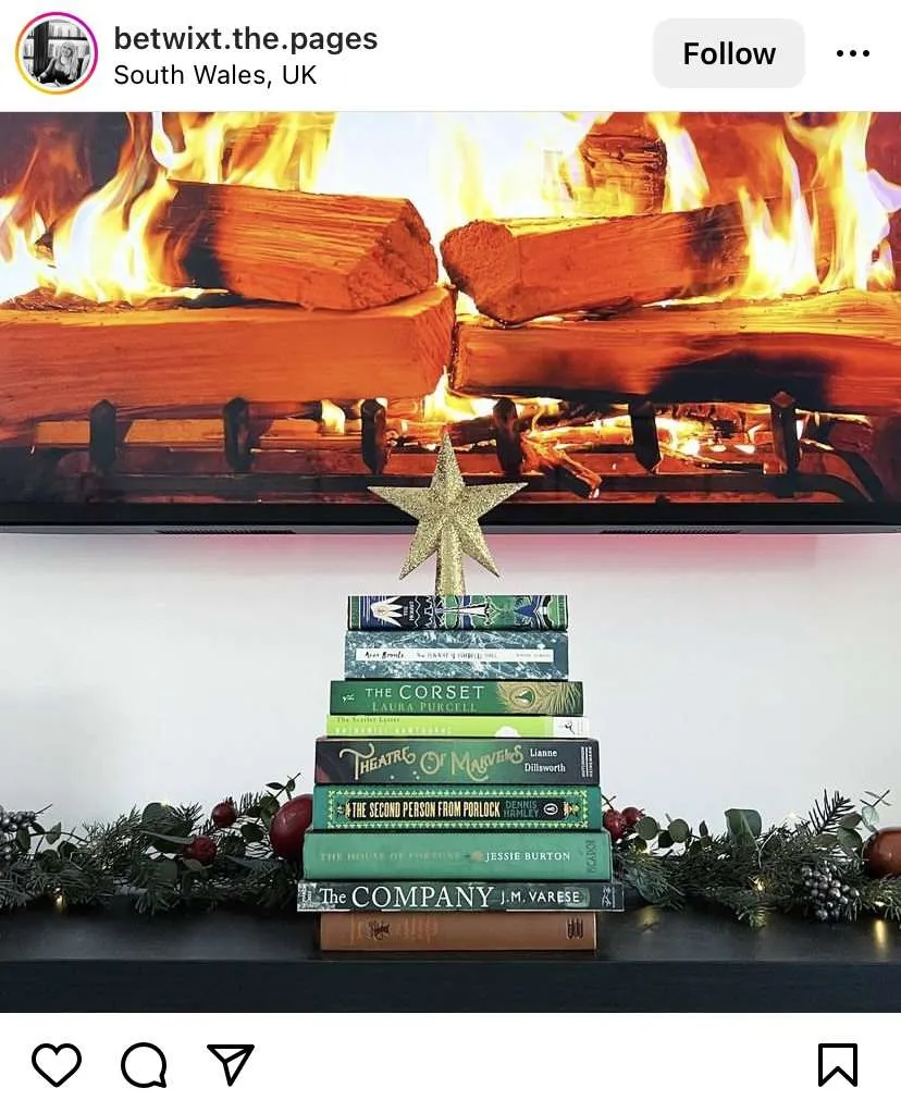 Bookmas Tree Ideas: stack of green books with star on top