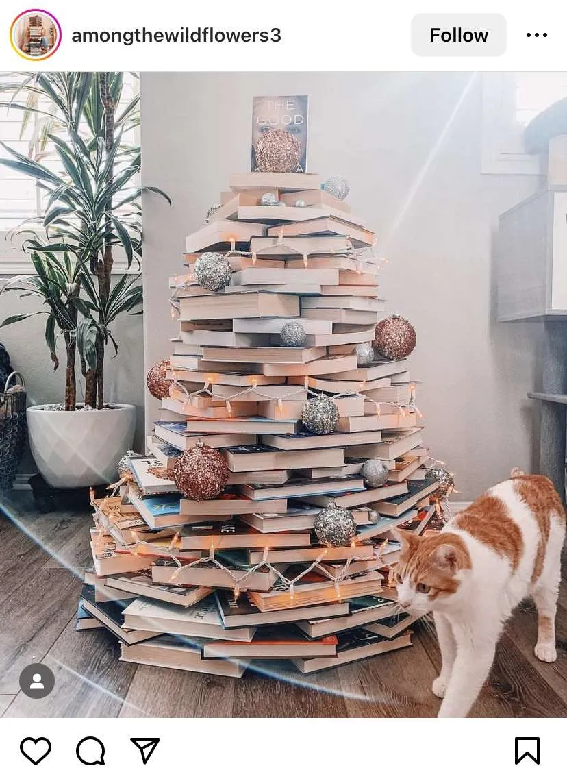 Bookmas tree ideas: circle book stack decorated like a Christmas tree.