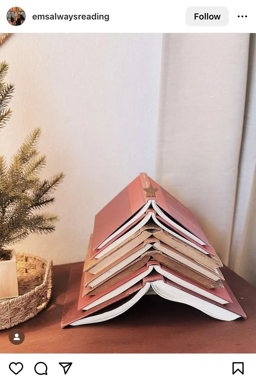 Bookmas Tree Ideas: stack open books on top of each other to create a Christmas tree shape and add star on top.