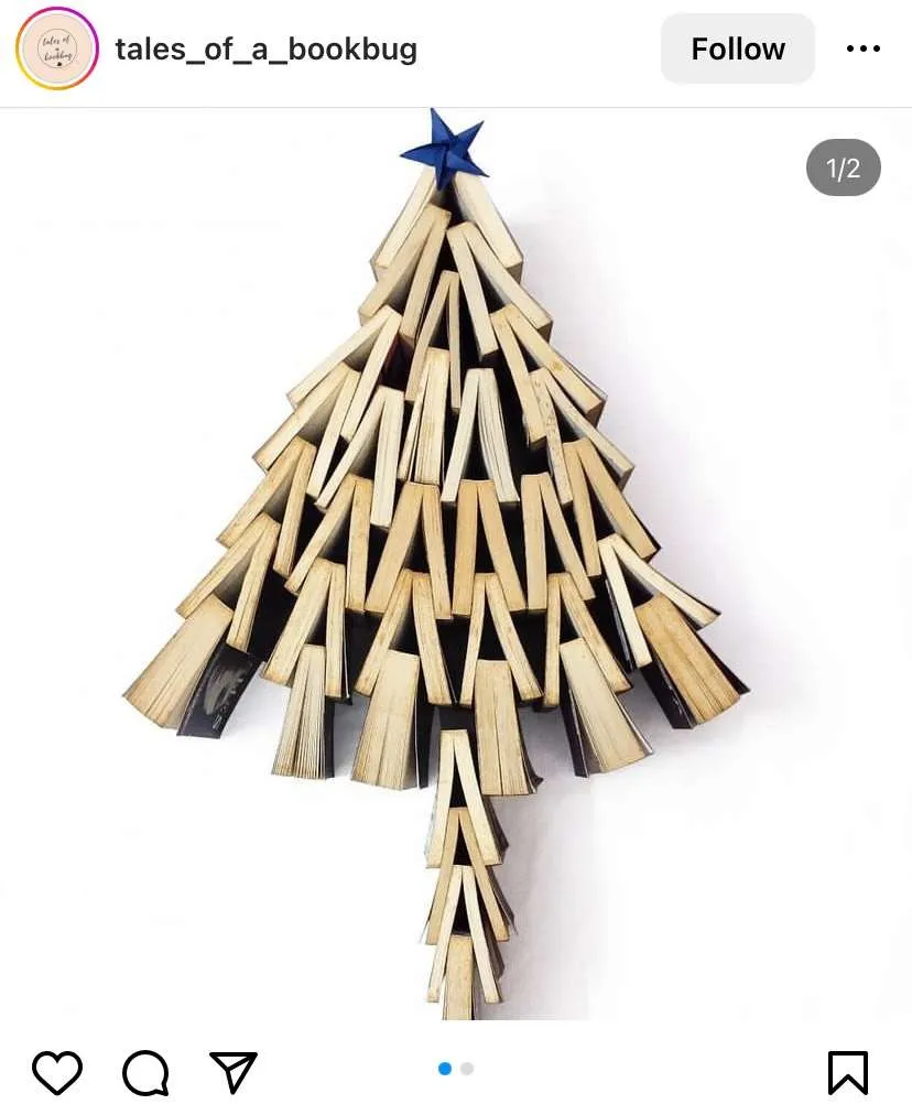 Bookmas Tree Ideas: Books stood upright in the shape of a Christmas tree