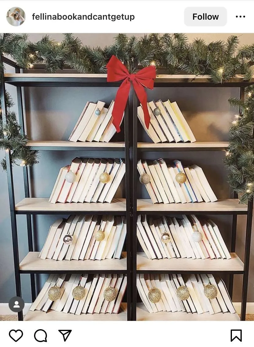 Bookmas tree idea: lean books on book shelves to form the shape of a Christmas tree