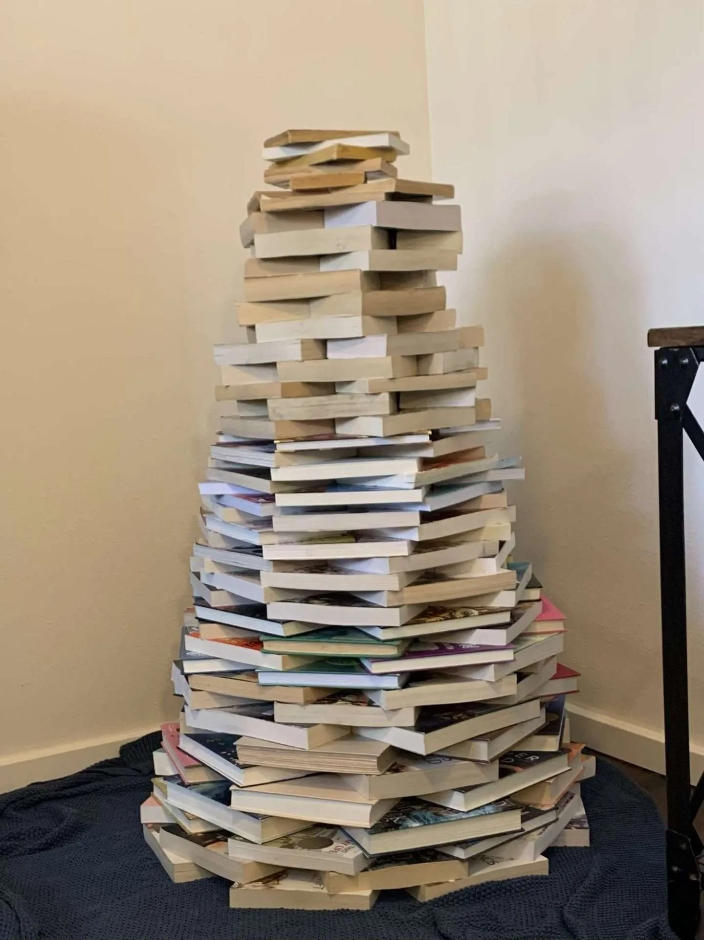 How to make a Christmas tree out of books.