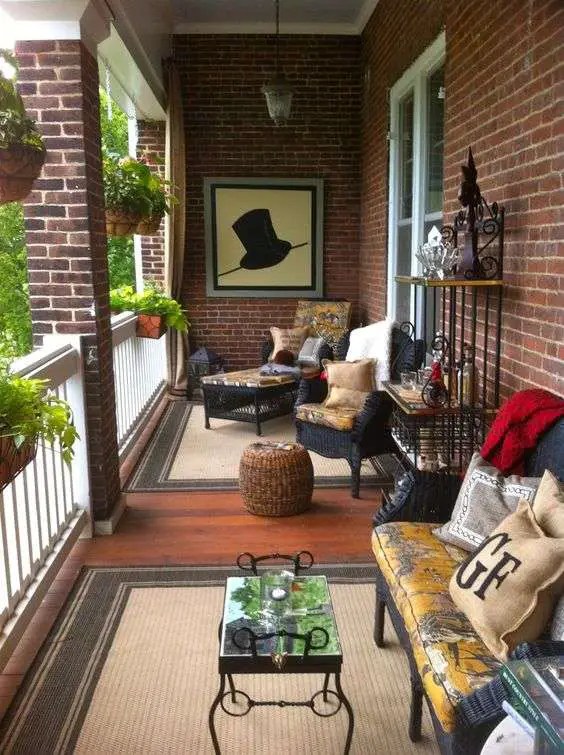 First rule of narrow porch decorating is to face the furniture out.