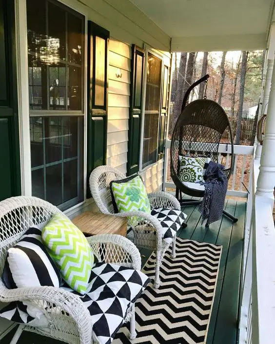 How to decorate a narrow porch: use a mix of patterns in the same color scheme.