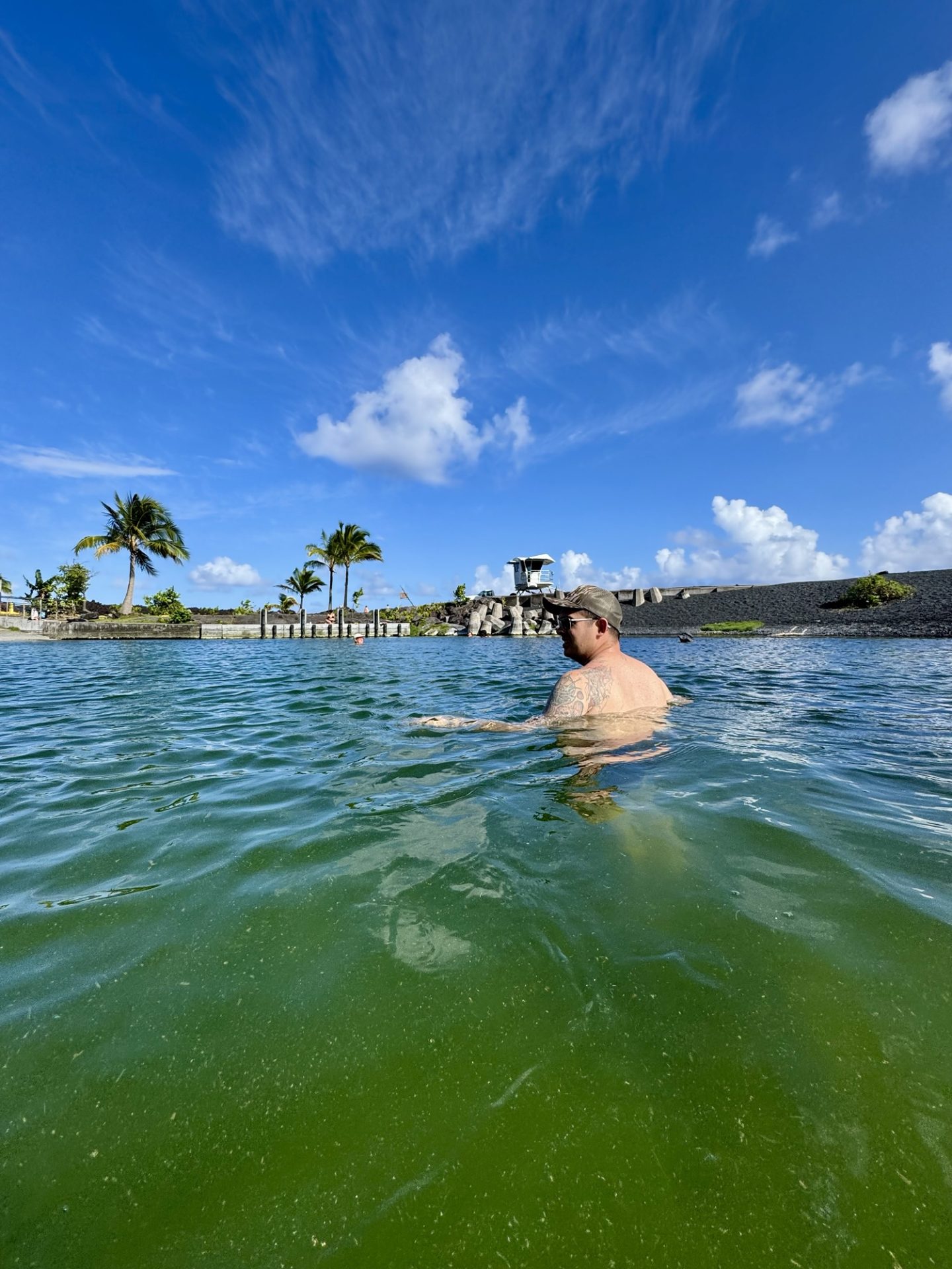 The water at the Big Island hot springs is dirty once you step on the bottom and stir up the algae.